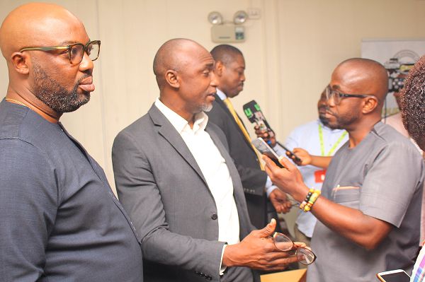  Mr Emmanuel Alex Yaw Asiedu (2nd left) being interviewed by Mr Charles Benoni Okine, Assistant Editor, Graphic Business