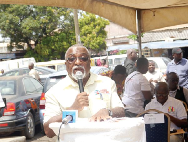 Mr Emmanuel Nartey-Tokoli, Managing Director of Jekora Ventures, addressing the people of Adabraka Odawna and spare parts dealers on sanitation enforcement. Pictures: PATRICK DICKSON