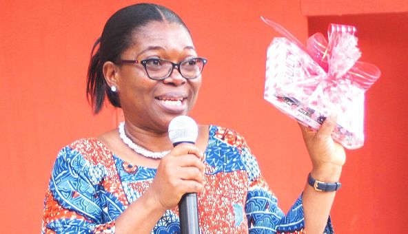  Mrs Ernestina Lartey Asinura, Executive Director of the Ghana Book Development Council launching the books