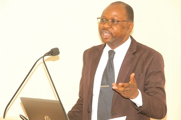 Dr Olorunda Joseph Olugbenga (right), addressing the health professionals. Pictures: Maxwell Ocloo