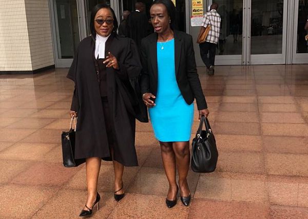 Ms Delese Mimi Darko (right) with her lawyer