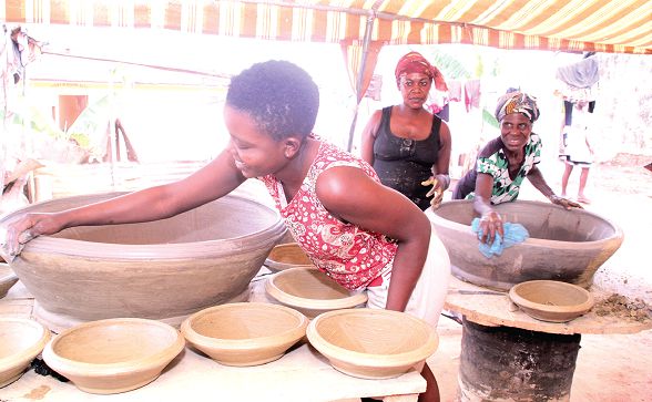  Potters working on the earthenware for the Easter fufu party