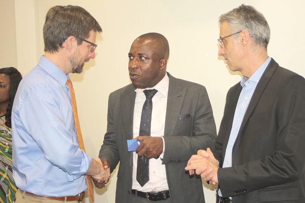 Dr Kwabena Twum Nuamah (middle), the Chairman of the Health Committee of Parliament, interacting with Mr Cyril Nogier (left), Senior Country Manager-Anglophone Africa Region of Gavi, at the meeting in Accra. Looking on is Mr Mark Saalfeld, Fund Portfolio Manager of High Impact Africa. Picture: GABRIEL AHIABOR
