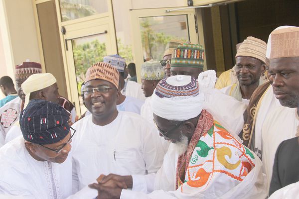 Sheikh Osman Nuhu Sharabutu (right) congratulating  Dr Mohammed Ibn Chambas after the lecture. With them is  Dr Mahamudu Bawumia (middle) 