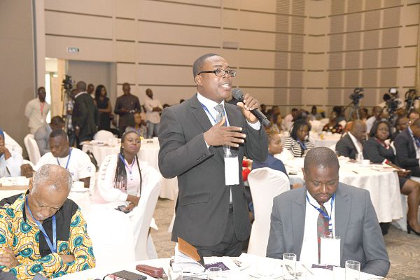 A participant asking a question during the meeting. Picture: EBOW HANSON