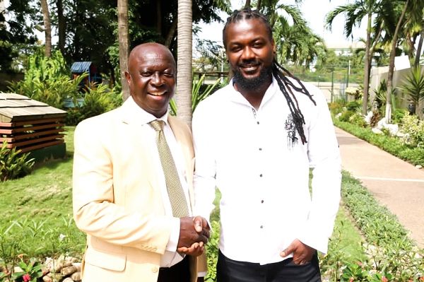 Samini (right) with SWAG President, Kwabena Yeboah
