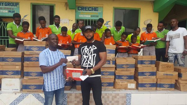 Global Aide International Foundation donates books to Success academy 