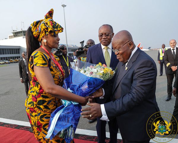 President Akufo-Addo presented with a bouquet on his arrival in Angola