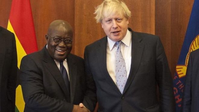Mr Boris Johnson, the UK Prime Minister of the UK and President in a handshake with President Akufo-Addo