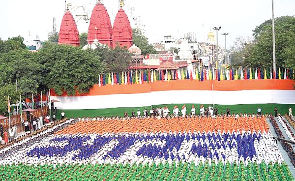 72nd Independence Day Celebration at Red Fort, Delhi. Students and teachers sit in a manner to depict the Indian National Flag with ‘Bharat’ written on it.