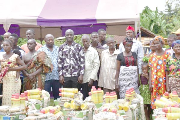 Mr Felix Nartey Odjao (arrowed), the DCE for Upper Manya Krobo,  with the beneficiaries