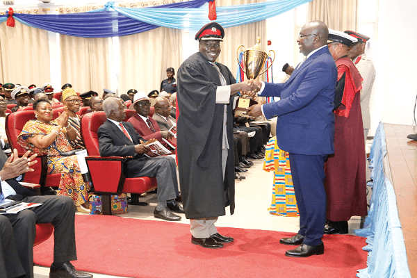 Vice-President Mahamudu Bawumia presenting the Chief of Army Staff’s Award to Maj. Isaac K. Boako (left) at the Ghana Armed Forces Command and Staff College graduation in Accra.