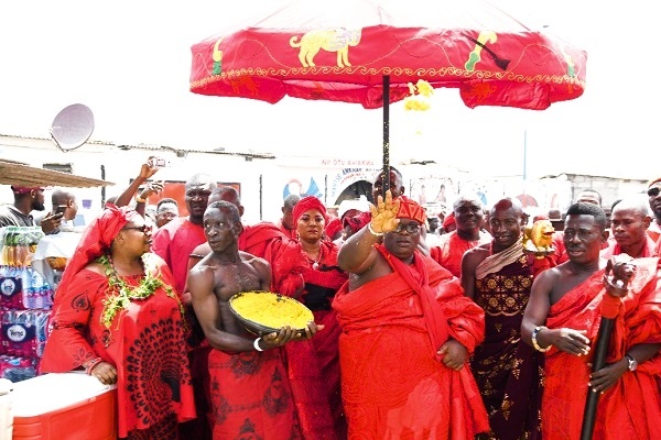 Nii Ayi-Bonte II, the Gbese Mantse,  sprinkling kpokpoi at the ceremony. Picture: EBOW HANSON