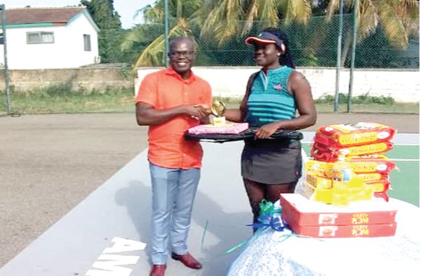  Emefa Nukpe being presented with her award by Justice Anthony Oppong, the AMTEC Chairman 