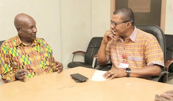 Ambassador Kojo Amoo-Gottfried (left), the President of GHACHIFA, explaining a point to Mr Kobby Asmah. Picture: EMMANUEL ASAMOAH ADDAI  
