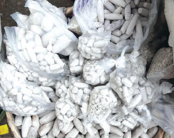 Packaged kaolin clay ready for sale at a market in Accra.