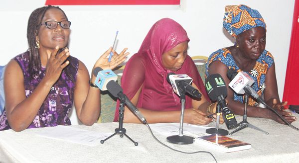 Ms Margaret Brew-Ward (left), Manager of Women’s Rights and Campaigns, ActionAid Ghana, speaking at the National Dialogue. With her are Ms Azumi Mesuna (middle), Manager for Promoting Opportunities for Women’s Empowerment and Rights and Ms Veronica Gbande, President, Smallholder Women Farmers' Movement.  Picture: Maxwell Ocloo