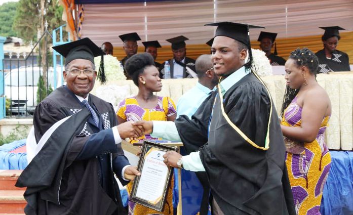  Prof. Jacob Molai Adotey (left) presenting an award to Mr Benjamin Bannerman, a graduating student of MAB Health Training Institute. Picture: ESTHER ADJEI