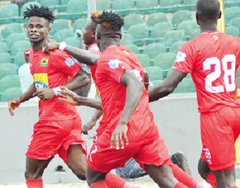 Some Kotoko players join Richard Arthur (left) to celebrate the opening goal yesterday. Picture: EMMANUEL BAAH 