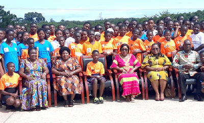 Mrs Cynthia Morrison (arrowed) and other dignitaries with participants at the summit