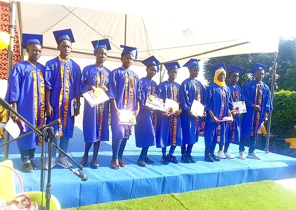 The graduates with their certificates.