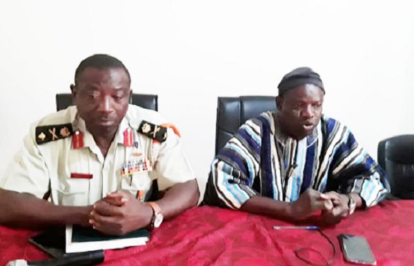 Mr Saeed (in smock) speaking at the press briefing. On his left is Brig. General Mohammed Aryee, General Officer Commanding, Northern Command of the Ghana Armed Forces