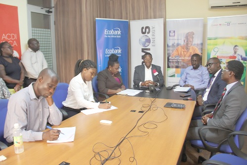 Mr George Sarpong (4th left) explaining a point to journalists during the media briefing. Picture: EDNA ADU-SERWAA