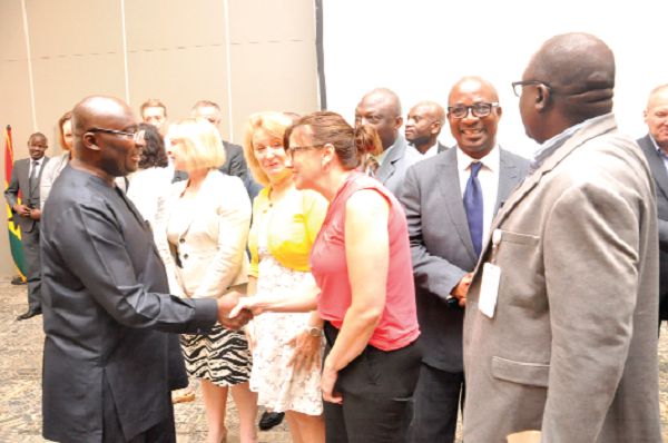 Vice-President Dr Mahamudu Bawumia exchanging pleasantries with guests after the opening session of the 11th International Upstream Forum in Accra. Picture: SAMUEL TEI ADANO
