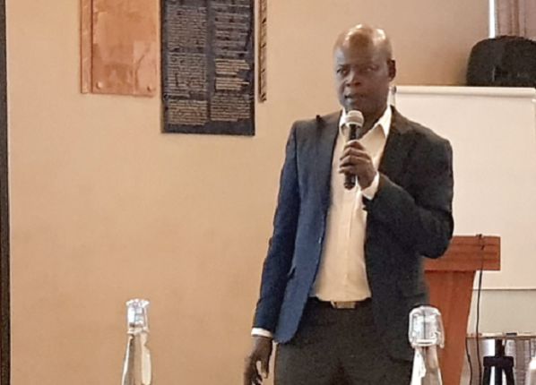 Dr Steve Manteaw (inset) addressing the Editors Forum on the management and use of petroleum revenues for 2018 at Senchi 