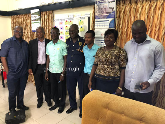 The Western Regional Police Commander, DCOP Mr Redeemer V. Dedjoe second from left, DSP, Dr. Alex Badu Boateng third right and Left-: SUPT. Dr Kofi Adjapong Afrifah and other members of the Regional Crime Officer, Supt. Ebenezer Boryor
