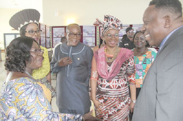 Mrs Frema Osei Opare (left), interacting with Mr Ben Kusi (right), Director, Membership and Regional Operations, National Health Insurance Authority, after the 2019 summit. Those with them are Mrs Cynthia Mamle Morrison (2nd left) and other officials of the Gender Ministry. Picture: EDNA ADU-SERWAA