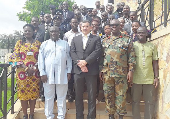 The participants after the opening ceremony. Second left (front row) is Dr Kwesi Aning. On his left is Mr Glen Askew. Also with them is Brig Gen Irvin Aryeetey, Deputy Commander of KAIPTC