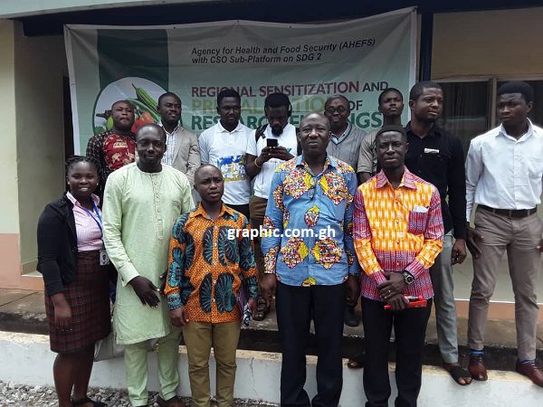 A group photo of some of the journalists with some executives of AHEFS after the media briefing. 