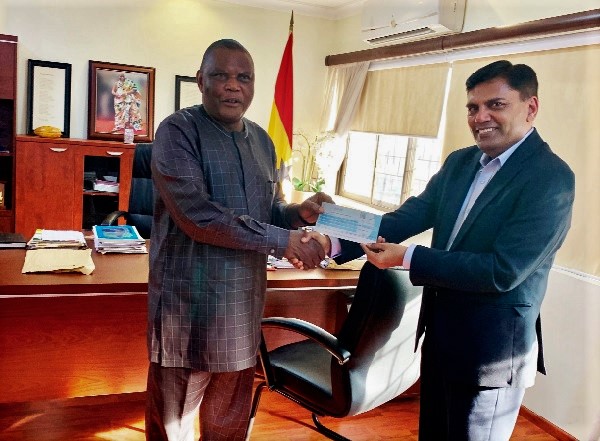  Mr Amit Agrawal (right) presenting the cheque to Dr Gyeile Nurah
