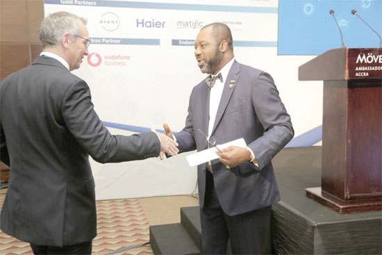 Mr John Glassey (left), Chief Executive Officer, Brands Africa, interacting with Dr Matthew Opoku Prempeh, the Minister of Education, after the opening ceremony. Picture: EMMANUEL ASAMOAH ADDAI 