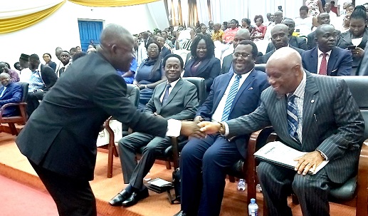 Lt Gen. Obed Akwa, Chief of the Defence Staff, Ghana Armed Forces (left), exchanging pleasantries with Justice Jones Dotse (right). Looking on are Apostle Professor Kwadwo Opoku Onyina (extreme left), former chairman of the Church of Pentecost and Dr. Emmanuel Hopeson (middle)
