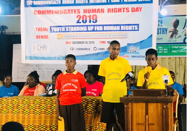 A student of the Kaneshie Cluster of Schools reading the statement
