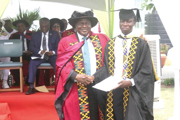 Prof. Enyonam  Kwawukume (left) with Simon Sackitey