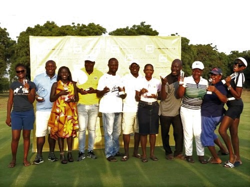 Winners displaying their trophies