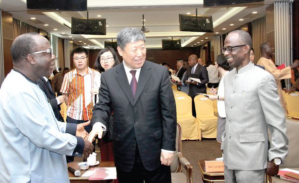 Mr Leng Rong (middle), member of the 19th Central Committee of the Communist Party of China (CPC) with Mr Freddie Blay (left), Chairman, New Patriotic Party, Mr Johnson Asiedu Nketia (right), Chairman, National Democratic Congress after the ceremony. Picture: BENEDICT OBUOBI 