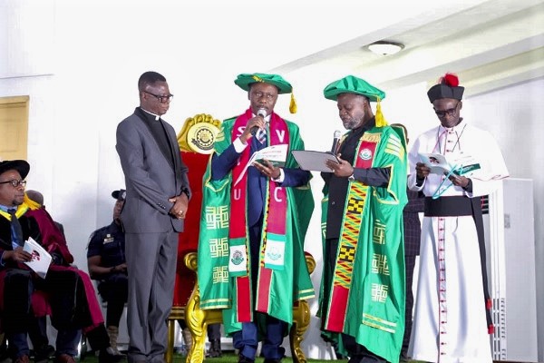  Dr Kwame Agyeman Boakye (2nd right), the Chairman of the STU Governing Council, administering the Oath of Office to Prof. Adinkrah-Appiah (2nd left)