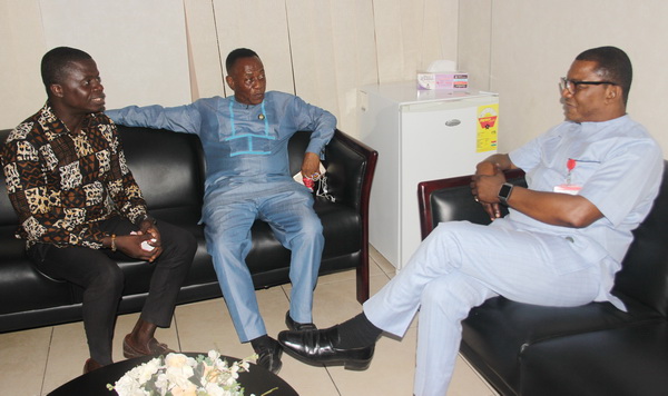 Mr Akwasi Ofori (left) briefing Mr Kobby Asmah on the Technological Exhibition yesterday.