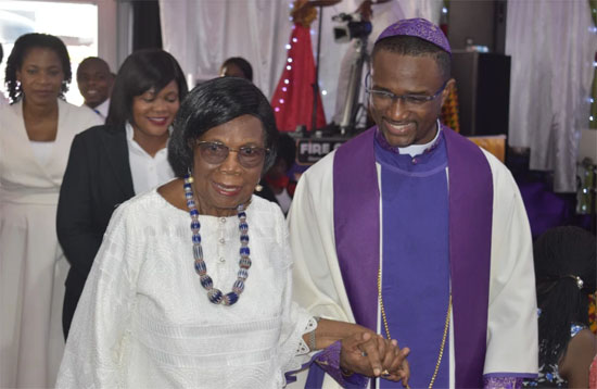 Bishop Dr. Charles C. Hackman welcoming Madam Salome Francois to FCC