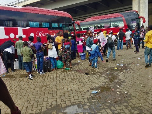 Travellers waiting for buses at the VIP Station at the Kwame Nkrumah Circle in Accra