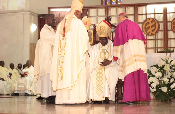 Most Rev John Bonaventure Kwofie being enthroned as Archbishop of Accra Archdiocese by His Eminence Peter Cardinal Appiah Turkson, Prefect of the Dicastery for Promoting Intergral Human Development and Most Rev Jean Marie (right), Apostolic Nuncio to Ghana . Picture: NII MARTEY M. BOTCHWAY