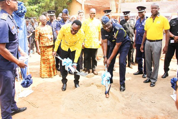 Mr David Asante-Apeatu (right), Inspector General of Police and Mr Selorm Adadevoh, the Chief Executive Officer, MTN Ghana breaking grounds to signify the commencement of the project. Looking on are other dignitaries. Picture: EDNA ADU-SERWAA