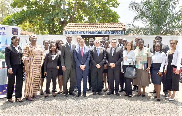 The Lebanese Ambassador to Ghana, Maher Kheir (5th left) with the beneficiaries. With them is Prof. Kofi Quashigah (4th left), Dean of the Faculty of Law of the University of Ghana
