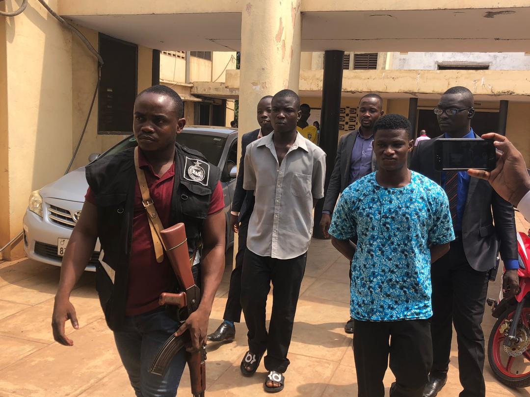 Daniel Asiedu (right) and Vincent Bosso(middle) being escorted to from the court premises after their committal