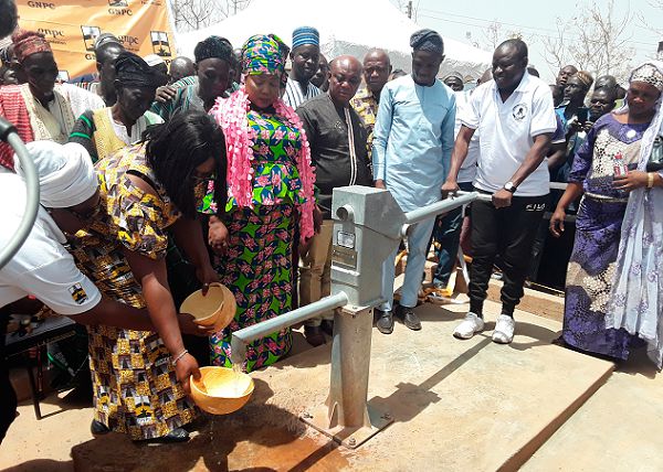 Mr Salifu Saeed pumping water from the borehole after it was handed over to the community for use. Pictures:SAMUEL DUODU