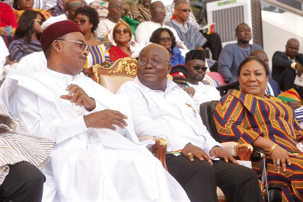  President Akufo-Addo in a chat with Mr Mahamadou Issoufou (left), the President of Niger. With them is Mrs Rebecca Akufo-Addo, the First Lady. Picture: SAMUEL TEI ADANO